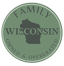 Green circular badge with the outline of Wisconsin in the center. Text reads: “FAMILY WISCONSIN OWNED & OPERATED.”.
