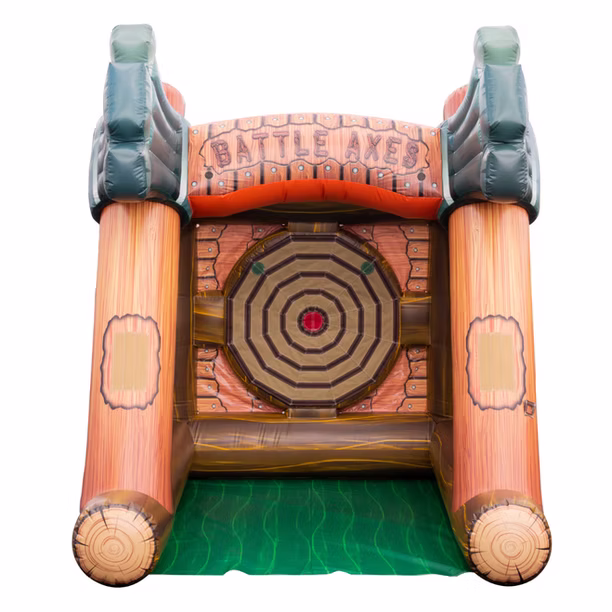 Inflatable axe throwing game with a target design in the center, labeled Battle Axes at the top, and large pillars resembling tree trunks on each side.