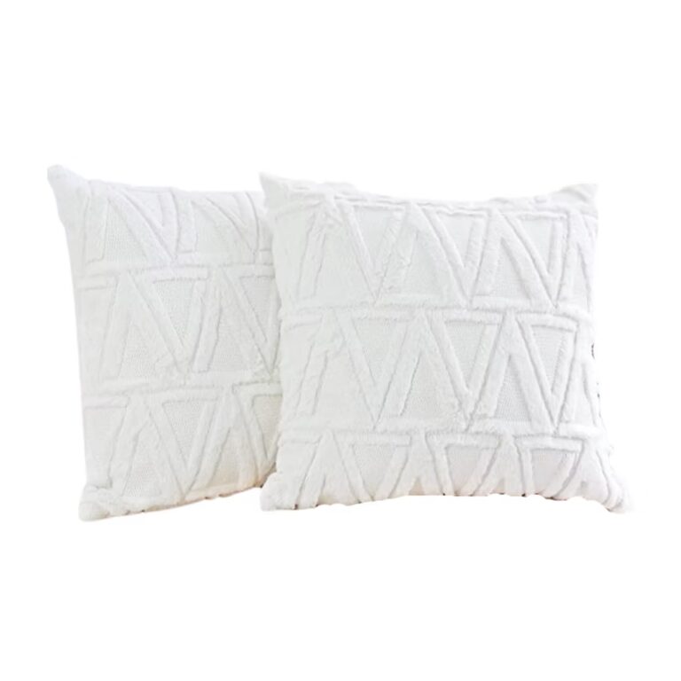 Two white decorative throw pillows with a textured, geometric pattern featuring raised triangular shapes, placed side by side against a plain white background.