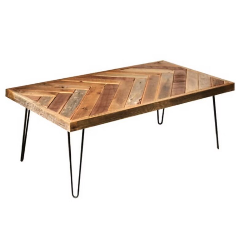 A rectangular coffee table with a wooden herringbone-patterned top and thin, black metal hairpin legs.