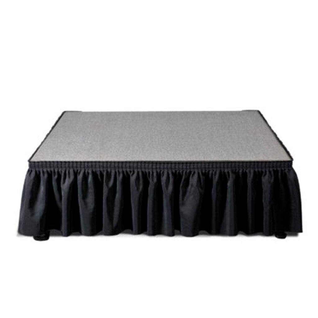 A rectangular stage platform with a gray top and a black fabric skirt around the sides, shown against a plain white background.
