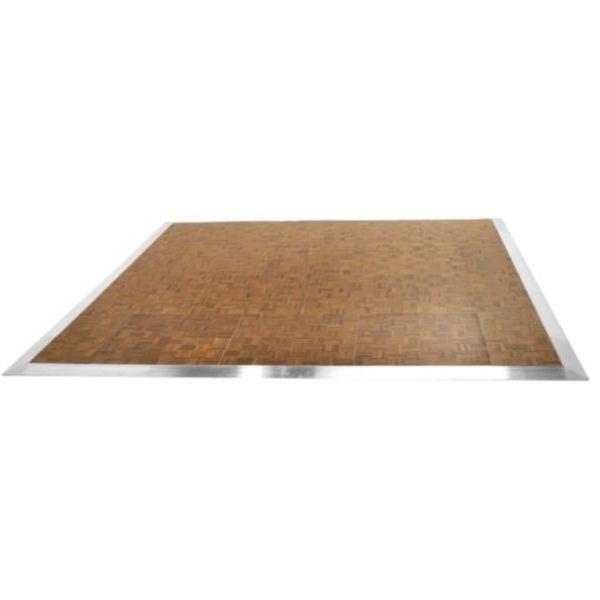 A rectangular wooden dance floor with a light brown parquet pattern, bordered by a silver metallic trim, shown on a white background—perfect for events where you can also rent tables, linens, and chairs for your holiday party.